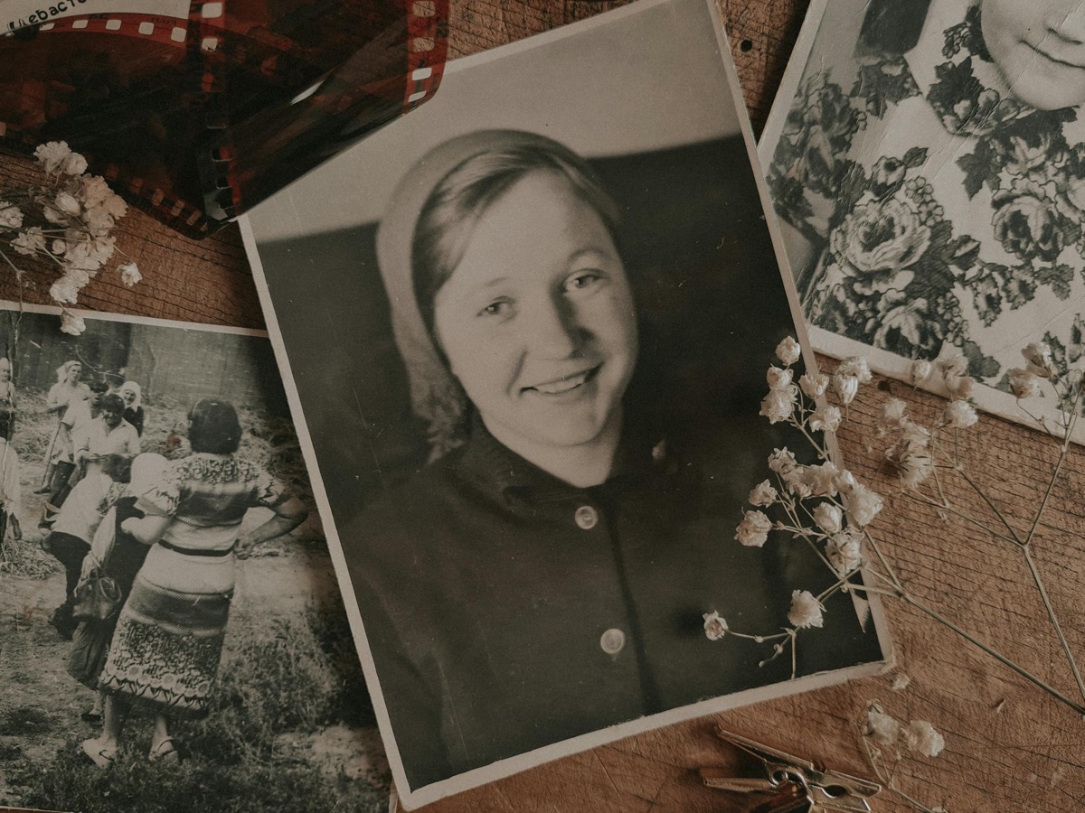 Vintage family portraits and keepsakes arranged on a table